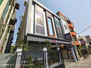 a building with a fence in front of it at Sai Balaji Residency in Shirdi