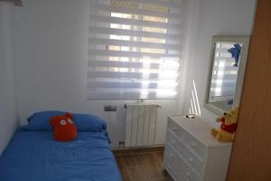 Postel nebo postele na pokoji v ubytování Villa Delfín