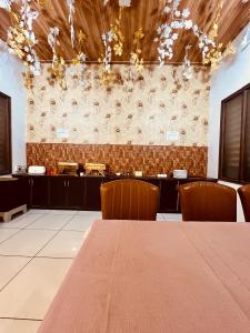 Posezení v ubytování Amora Rooms Dwarka