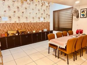 Posezení v ubytování Amora Rooms Dwarka