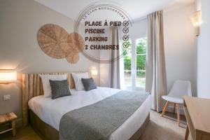Posteľ alebo postele v izbe v ubytovaní Rêves du Sud plage à pied et Saint Tropez V + 16 fotografií