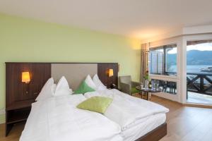 Letto o letti in una camera di See & Wellnesshotel Gerbi