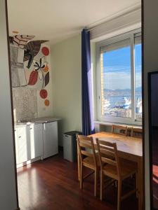 A kitchen or kitchenette at NAPOLI MOOD Il Golfo Apartments