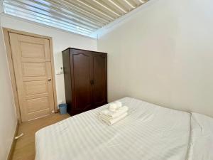 Postel nebo postele na pokoji v ubytování Marc Hotel Maesai