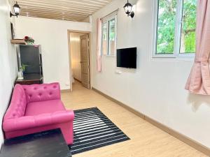 TV a/nebo společenská místnost v ubytování Marc Hotel Maesai