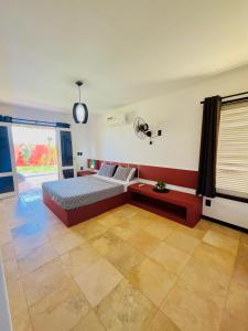 Łóżko lub łóżka w pokoju w obiekcie Kitesurf Oasis Maracajaú