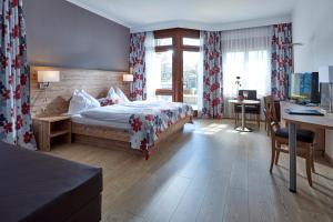Letto o letti in una camera di See & Wellnesshotel Gerbi
