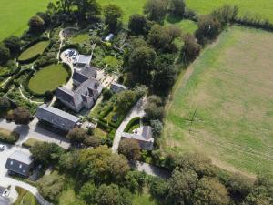 an overhead view of a house with a park at Little Crugsillick in Veryan