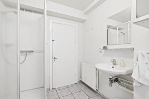 Koupelna v ubytování Acco Guesthouse