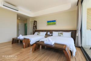 Postel nebo postele na pokoji v ubytování Pon Pon Wu Homestay