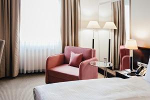 Posteľ alebo postele v izbe v ubytovaní Crowne Plaza Bratislava by IHG