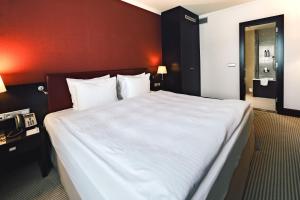 Posteľ alebo postele v izbe v ubytovaní Crowne Plaza Bratislava by IHG