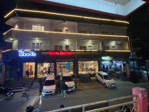 a group of cars parked in front of a building at HOTEL ABODE in Shillong