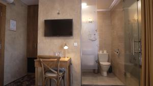 Koupelna v ubytování Garni Hotel Chicha - Winery ŠKRBIĆ + 37 fotografií