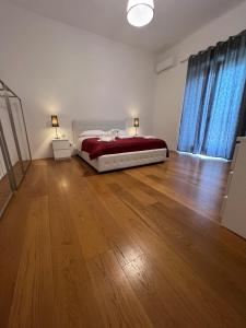 Voodi või voodid majutusasutuse Terrazza Vanvitelli toas
