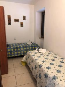 a room with two beds in a room at APPARTAMENTO Tamburro in Campobasso