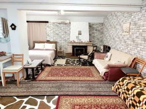 Posezení v ubytování Nice house close to the sea + 42 fotografií