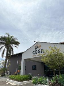 a building with a sign that reads cebil hotel jerusalem at Cegil Hotel Boulevard in Resende
