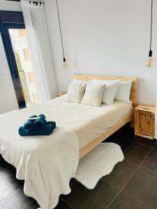A bed or beds in a room at Mirador del Río