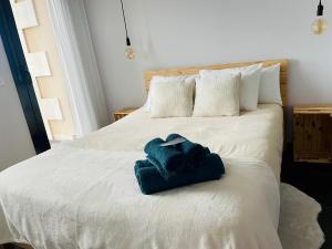 A bed or beds in a room at Mirador del Río