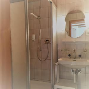 Koupelna v ubytování Wellnesshotel Liun