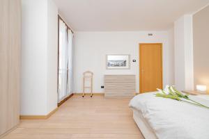 Postel nebo postele na pokoji v ubytování Milan Forum Camelia Guesthouse