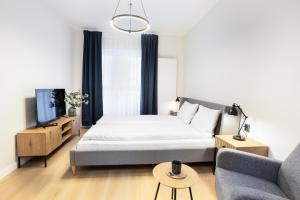 Aparthotel City Break Plac Wolności 6客房内的一张或多张床位