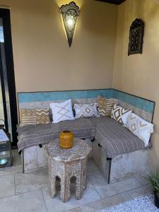 Istumisnurk majutusasutuses Le Riad Private Pool Piscine privée