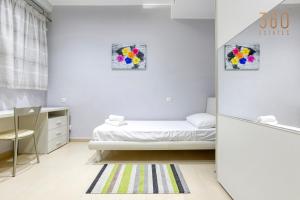 Un ou plusieurs lits dans un hébergement de l'établissement Charming 2BR home w/access to pool in Marsaskala by 360 Estates