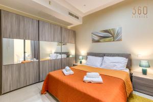 Un ou plusieurs lits dans un hébergement de l'établissement Charming 2BR home w/access to pool in Marsaskala by 360 Estates