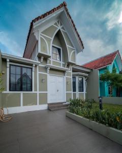 a large house with a garage at Danka@tudor residence in Batam Center