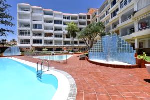 Bazén v ubytovaní Moon Dunes Apartment - by Yumbo Center - Playa del Ingles alebo v jeho blízkosti