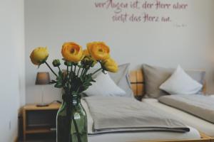 Letto o letti in una camera di Chrischona Berg