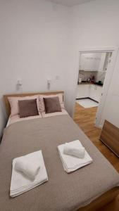 Postel nebo postele na pokoji v ubytování Apartment Green Lux