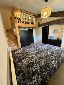 Postel nebo postele na pokoji v ubytování Gîte Libellule à Coulon