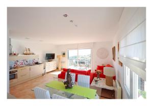 Μια τηλεόραση ή/και κέντρο ψυχαγωγίας στο Appartement vue Mer à 300m de la plage - Son Parc