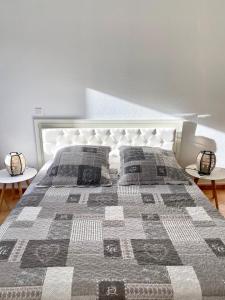 Postel nebo postele na pokoji v ubytování APPARTEMENT T3, ORIENT BAY