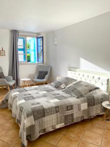 Postel nebo postele na pokoji v ubytování APPARTEMENT T3, ORIENT BAY