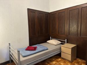Postel nebo postele na pokoji v ubytování Kecskeméti Rooms