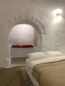 Postel nebo postele na pokoji v ubytování PANO Apartment