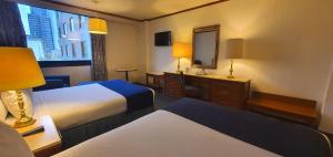 Postel nebo postele na pokoji v ubytování Hotel Bristol + 37 fotografií
