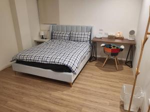 Letto o letti in una camera di 9 Tan Yuan Homestay