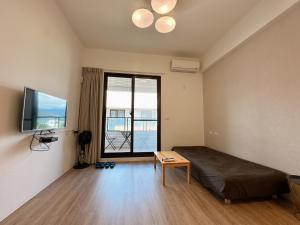 TV o dispositivi per l'intrattenimento presso 9 Tan Yuan Homestay