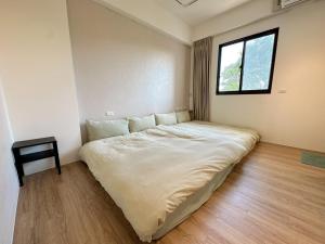 Letto o letti in una camera di 9 Tan Yuan Homestay