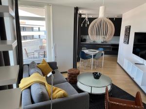 Posezení v ubytování ÅhusBrygga Apartment Hotel