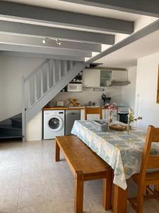 Een keuken of kitchenette bij Maison 3 ch, clim, accès plage