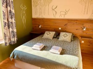 Voodi või voodid majutusasutuse Taos B&B toas