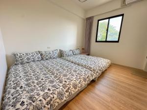 Letto o letti in una camera di 9 Tan Yuan Homestay