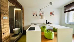 a kitchen with a white counter and a sink at Smart Apartment Warsaw in Warsaw