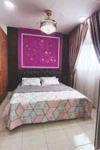 Katil atau katil-katil dalam bilik di Imani Suite Alanis Residence KLIA